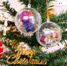 two ornaments hanging from a christmas tree