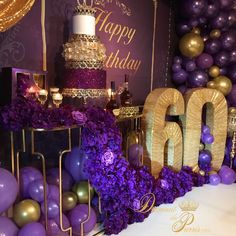 a purple and gold 50th birthday party with balloons, cake, candles, and decorations