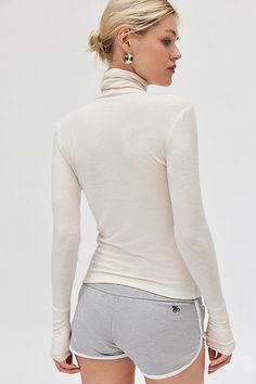 Wardrobe staple Out From Under turtleneck in a slim & cropped style. Features a high turtleneck and long sleeves. Designed in an ultra-soft, lightweight knit perfect on its own and layered. Find this perfect better-than-basic top only at Urban Outfitters. Features Out From Under Laurelie layering turtleneck tee Mockneck tee Soft and stretchy jersey knit Lightweight layering knit High turtleneck and long sleeves Slim bodycon fit Cropped length Easy pull-over style UO exclusive Content + Care 66% Versatile Funnel Neck Turtleneck For Spring, Versatile High Neck Turtleneck For Spring, Fitted Fine Knit Turtleneck For Spring, Fitted Funnel Neck Top For Loungewear, Funnel Neck Top For Loungewear, Versatile Turtleneck Tops For Winter, Fitted Turtleneck Tops For Loungewear, Fitted Cropped Turtleneck For Fall, Slim Fit Turtleneck Tops For Fall