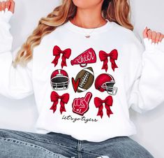 Football Coquette Bow Sweatshirt,Custom Football Bow School Spirit Sweatshirt,Football Cheer Sweatshirt, Cheer Mom Sweatshirt,Cheerleader Gift, Football Team Sweatshirt,,  🌟 **Welcome to LazTeeApparel 🌟 **Product Details Our sweatshirts are designed for robustness and comfort, featuring superior materials and double-needle stitching. 👕 Unisex sizing for a relaxed fit 🌟 Cozy blend of 50% cotton and 50% polyester 🔄 Reinforced with double-needle stitching for added durability Our sweatshirts employ the DTF (Direct to Film) printing method, ensuring vivid and lasting designs. **How to Order 1️⃣ Check out our detailed product photos for all available options. 2️⃣ Select your size and color from the dropdown menus. 3️⃣ Customize with your chosen text color. 4️⃣ Specify the desired quantity. Cheer Sweatshirts Design, Cheer Sweatshirts, Cheerleader Ideas, Cheer Jackets, Cheerleader Gift, Bow Sweatshirt, Football Cheer, Team Sweatshirts, Jacket Ideas