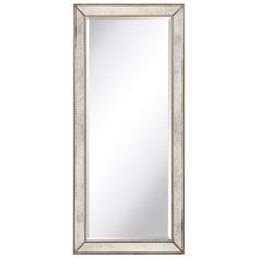 a large silver framed mirror on a white wall with an ornate border around the edge