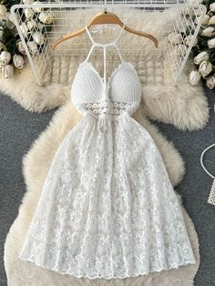 Crochet Lace Beach Dress, Elegant Crochet Dresses For Vacation, Chic White Crochet Halter Neck Dress, White Hollow Out Dresses For Summer, Elegant Crochet Lace Dress For The Beach, Fitted Crochet Dress With Lace Patchwork For Summer, Casual Beach Dress With Lace Patchwork, Summer Beach Dresses With Lace Patchwork, Elegant Halter Neck Crochet Dress For Beach