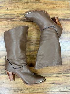 Gold Toe Cap Brown Boots With Wooden Heel For Fall, Brown Boots With Wooden Heel And Round Toe, Brown High Heel Boots With Wooden Heel, Vintage Brown Heeled Boots With Stacked Heel, Western Mid-calf Boots With Stacked Heel, Fitted Western Mid-calf Boots With Stacked Heel, Brown Mid-calf Western Heeled Boots, Brown Western Mid-calf Heeled Boots, Wood Heel