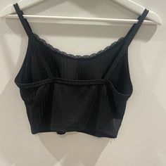 Bought This From A Small Boutique, Never Worn, I Have To Many Black Tank Tops So I Never Reach For It. Very Comfy And New Condition. Black Crop Top Camisole For Night Out, Casual Black Camisole For Night Out, Casual Tank Top With Lace Trim For Night Out, Casual Lace Trim Tank Top For Night Out, Casual Lace Trim Camisole For Night Out, Black Lace Tank Top With Spaghetti Straps, Casual Black Tank Top With Lace Trim, Black Stretch Cropped Camisole, Fitted Black Tank Top With Lace Trim