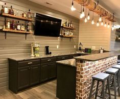 a bar with several stools in front of it