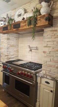 a stove top oven sitting inside of a kitchen