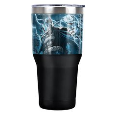 the batman tumbler cup is shown with lightning in the background and bats on it