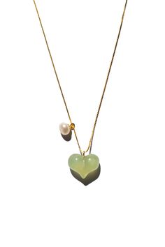 The Puffed Heart Necklace features a green jade heart pendant, puffed to perfection, complemented by a delicate pearl. The unique puffed design of the jade heart adds a playful touch, making it an irresistibly cute accessory. Avoid knocking against hard surfaces. Jade pieces are brittle and will break when hit with hard objects. Make sure that you take off your jewelry before you go swimming in a pool or hot tub. If you’re handling dirt and soil, quartz dust in soil is abrasive to the stone. Avoid cleaning your jade with any acids or alcohol! It is suggested to only apply water or water mixed with mild soap to get it nice and clean. Capri Fashion, Puffed Heart Necklace, Go Swimming, Dad Jewelry, Fashion Boy, June Birthstone Jewelry, Puffed Heart, Gifts For New Mums, Pearl Jewellery Earrings