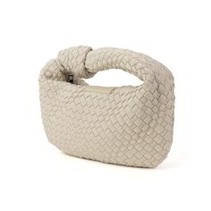 Our handwoven Knot bags are perfect for any occasion! Whether you're headed to a casual brunch, fancy event or a night on the town, this unique bag will make just the right statement. Woven neoprene & Lycra blend Zipper enclosure Shiny gunmetal tone hardware Dimensions: 11" L x 7" H x 2” D, Handle Drop: 3” Trendy Woven Clutch Shoulder Bag, Modern Shoulder Bag With Braided Handles Clutch, Modern Clutch Bag With Braided Handles, Beige Woven Leather Clutch Bag, Chic Textured Travel Bag, Spring Everyday Bags With Intrecciato Weave, Chic Textured Tote Bag, Everyday Intrecciato Weave Bags For Spring, Chic Intrecciato Weave Pouch Bag