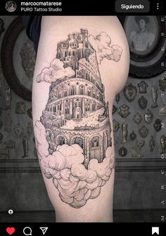 a woman's thigh with a drawing of a castle in the clouds on it