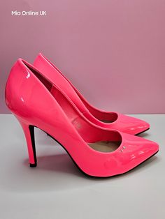 Classic Women's Stilettos in Neon Pink with the classic 4 inch heel and pointed toe adding a touch of class and elegance to any outfit. Whether wearing for work, party or for a lunch out these shoes are the perfect go to whether you're wearing a dress or jeans.  LET'S GET PERSONAL! Why not add a personalised touch to your shoes with our 3 rhinestones, these are an optional extra should you wish to add even more glam and have your shoes your way. You can select this option in the drop down before Classic Pink Heels With 4-inch Heel, Pink Heels With Reinforced Heel And Pointed Toe, Pink Pointed Toe Heels With Reinforced Heel, Classic Pink Heels With Sculpted Heel, Classic Pink Closed Toe Heels, Classic Pink Heels With Padded Heel, Classic Pink Pointed Toe Heels, Classic Pink Snug Fit Heels, Classic Fitted Pink Heels