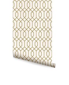 a white and gold wallpaper with geometric design