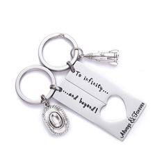 two metal bottle openers with the words to infinity and beyond