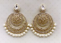 Bollywood Kundan Earrings/Indian Earrings/pearl Earring/Pakistani Earrings/Statement Earrings/Long chandelier/bridal earring/Indian wedding Arrives in a gift box Color, shades, texture displayed may slightly vary from the actual product due to digital image limitations. We request you to consider these minor variations. Please expect the possibility of some slight imperfections when buying handmade jewelry. If you have any questions, please contact us. Bollywood Style Chandbalis With Intricate Design For Eid, Elegant Chandbalis For Eid And Wedding, Gold Round Chandbalis For Party, White Chandbalis For Wedding Eid, White Chandbalis For Eid Weddings, White Chandbalis For Wedding And Eid, Elegant Chandbalis For Wedding And Eid, Elegant Chandbali Chandelier Earrings For Wedding, Gold Chandbali Jhumkas For Wedding