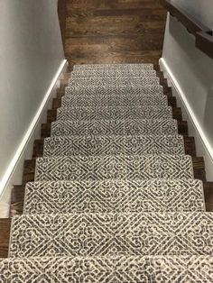 an image of stairs with carpet on them