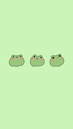 three little green frogs sitting in the middle of a row on a green background with pink cheeks