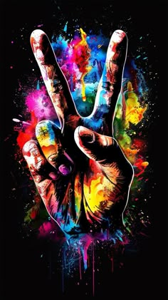 the peace sign is painted with colorful paint and splattered on it's sides