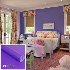 a bedroom with purple walls and curtains