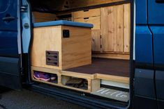 the inside of a van with its doors open