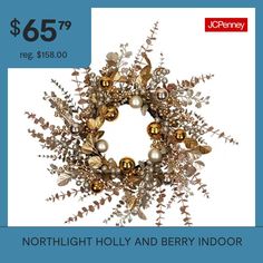 a christmas wreath with gold ornaments and greenery is on sale for $ 65 99