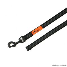 an orange and black leash on a white background