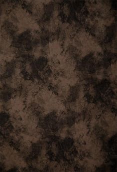 a brown and black textured wallpaper that looks like something out of the ground