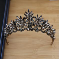 Gender:Girls',Women's,Ladies; Gemstone:Crystal; What's in the box:Crown; Gemstone Color:White,Black; Theme:Mini; Shape:C Shape; Types:Masquerade,Crown; Holiday:Carnival,Halloween; Style:Gothic,Retro Vintage; Width of pendant:13; Jewelry Type:Wreaths,Tiaras; Occasion:Ceremony,Party / Evening,Party Evening,Sweet 16,Wedding Party,Party / Cocktail,Festival,Beauty Therapy,Wedding,Evening Party; Material:Alloy; Width:13; Height:6; Characters:Black Swan; Design:Fashion,Sexy,Crystal; Features:Mini,Creat Party Tiara, Dress Dinner, Masquerade Wedding, The Black Swan, Crown Black, Beauty Therapy, Cosplay Halloween, Vintage Gothic, Bridal Crown