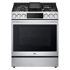 a silver stove top oven sitting on top of a white counter