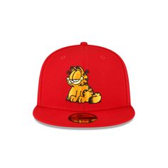 a red hat with a cartoon character on it