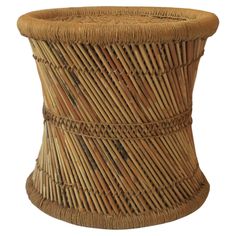 a small wicker stool made out of bamboo