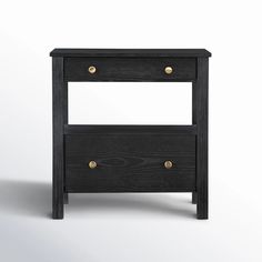 the side table has two drawers on each side and one drawer is open with gold knobs