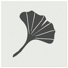 the silhouette of a ginko tree leaf