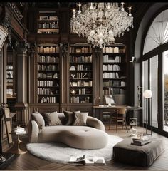 a living room filled with furniture and a chandelier