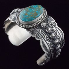 Navajo "Old Style" Natural Turquoise Mountain Bracelet - STB#1315 | "Old Style" Sterling Silver Bracelet Set With A Natural Turquoise Mountain Stone.  Masterfully Handcrafted And Designed By Navajo Artists MICHAEAL & ROSE CALLADITTO. Details Artist Hallmark:  "M & R Calladitto, Navajo"  (inscribed on back side of bracelet) Materials:  Sterling Silver And Natural Turquoise Mountain Turquoise Technique:  Cabochon, Stampwork, Appliqué, Flattened Twist Wire, Bead Wire, Satin Finish Face Height: Luxury Turquoise Sterling Silver Round Bracelet, Unique Engraved Turquoise Bracelets, Artisan Turquoise Engraved Bracelets, Artisan Turquoise Engraved Bracelet, Traditional Engraved Turquoise Bracelets, Traditional Turquoise Engraved Bracelet, Artisan Engraved Blue Bracelets, Blue Turquoise Oval Bracelet, Sterling Silver Turquoise Bracelet Gift