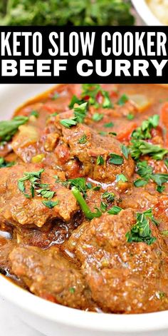 keto slow cooker beef curry in a white bowl with parsley on top