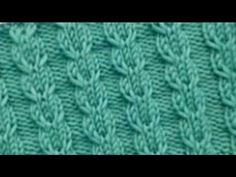 green knitted fabric with small leaves on the top and bottom side, showing stitching