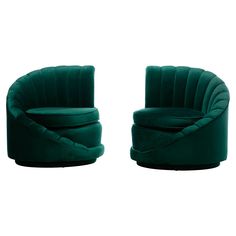 two green chairs sitting next to each other