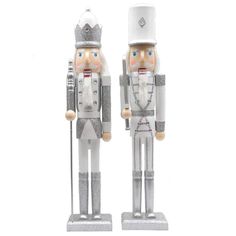 two nutcrackers are standing next to each other