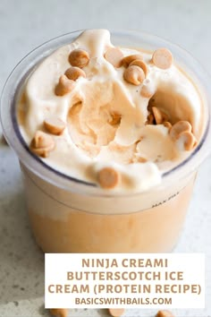 a cup filled with whipped cream and nuts