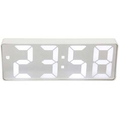 the digital clock is displayed on a white surface