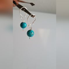 These New Dainty Turquoise Earrings Are Handmade And The Perfect Classic Pair To Own. These Simple Earrings Are Made Of Turquoise Stone And Sterling Silver. Great For Everyday Wear! Adjustable Turquoise Earrings With Ear Wire, Turquoise Round Beads Earrings For Gift, Minimalist Turquoise Earrings For Everyday Wear, Minimalist Turquoise Earrings For Everyday, Minimalist Turquoise Teardrop Earrings, Turquoise Round Bead Earrings For Everyday, Nickel-free Turquoise Earrings For Gift, Turquoise Earrings With Ear Wire For Gift, Round Turquoise Earrings For Gift