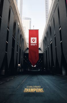 the entrance to an underground parking garage with a red banner hanging from it's side