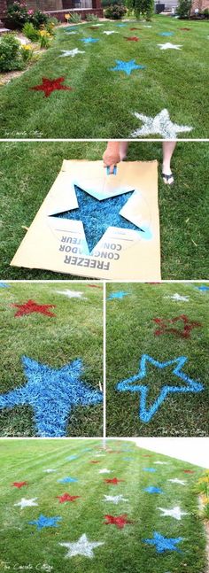 an outdoor lawn decorated with blue, red and white stars in the shape of a star