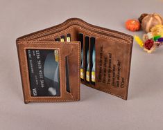 "This handmade leather trifold wallet is the perfect gift for any man. The wallet can be personalized with an engraved message to make it a very special Christmas, anniversary, birthday, or Fathers Day present. The stylish design includes 8 card slots, 2 money pockets and 2 ID windows that will hold all your credit cards, cash, and receipts without bulging out of your pocket. When you buy it, you will be amazed by luxury feeling and fine workmanship. It is highly practical and convenient for eve Brown Trifold Wallet With Card Slots As Gift, Father's Day Gift Trifold Wallet With Rfid Blocking, Bifold Card Holder For Father's Day Gift, Father's Day Gift Trifold Wallet With Card Slots, Father’s Day Gift Trifold Wallet With Card Slots, Father's Day Trifold Wallet With Card Slots, Father's Day Gift Trifold Wallet, Trifold Wallet With Card Slots As Gift, Trifold Wallet With Interior Card Slots As Gift