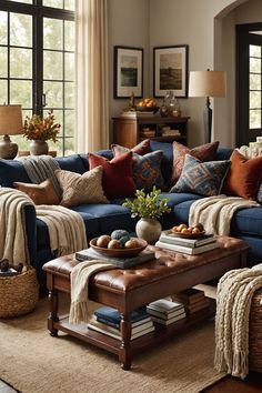 a living room filled with lots of furniture and pillows on top of it's couches