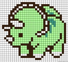 a cross stitch pattern with a green face