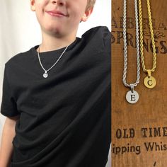 * Material: Stainless steel * Plating: 14k gold,  * Colors: Gold, silver or matte grey * Nickel free, hypoallergenic!  * Makes a great kids gift! * Super durable, shower/bath safe and is easy to keep clean! Kids initial necklace, makes a statement jewelry piece for every little man. Durable material for an everlasting gift. No special care is needed, swimming, shower, sweat, all is good with this material! It will never tarnish or turn the skin green. The letters are cut out so the pendant is ho Baby Boy Jewelry Necklace, Necklace Boys, Jewelry Boys, Necklace Rope, Custom Pendant, Christmas Gifts For Boys, Basket Gift, Rope Chain Necklace, Gift Envelope