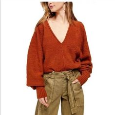 Free People Reverie V-Neck Sweater Burnt Butter Brand New With Tags. Size Small. Burnt Butter, Flirty Tops, Asymmetrical Sweater, Orange Sweaters, Bell Sleeve Sweater, Oversized Knitted Sweaters, Oversize Knit, Free People Sweaters, Ribbed Knit Sweater