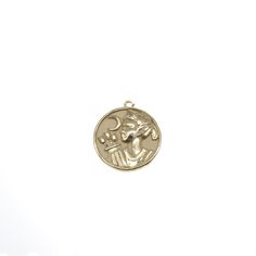 Show your strength with this sold gold Artemis Coin. Goes great on a bracelet or a dainty chain. 14k Yellow Gold, 14k White Gold, or 14k Rose Gold Measurements: 16.9mm Round Celestial Yellow Gold Charms As Gifts, Recycled Gold Rose Gold Pendant Jewelry, Rose Gold Recycled Gold Pendant Jewelry, Bronze Tarnish Resistant Pendant Jewelry, Bronze Tarnish-resistant Pendant Jewelry, Symbolic 14k Gold Medallion Jewelry, 14k Gold Medallion Jewelry With Charms, Symbolic Rose Gold Sterling Silver Jewelry, Symbolic Rose Gold Round Jewelry