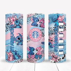 three different types of starbucks's coffee cans on a white table with pink and blue designs